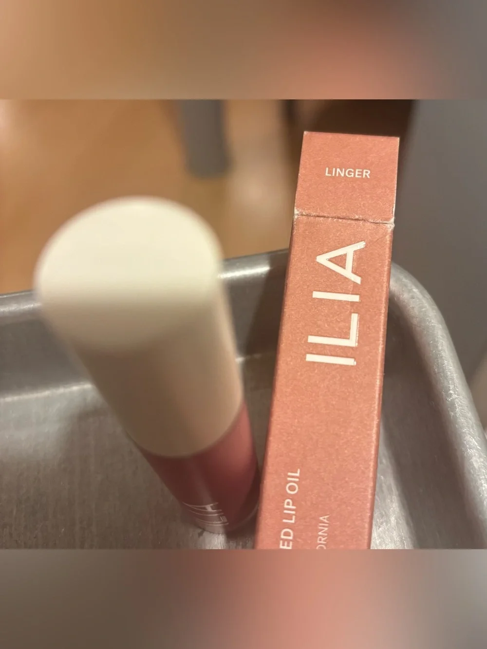 ILIA Linger Lip Gloss Balm in shade Linger a mauve